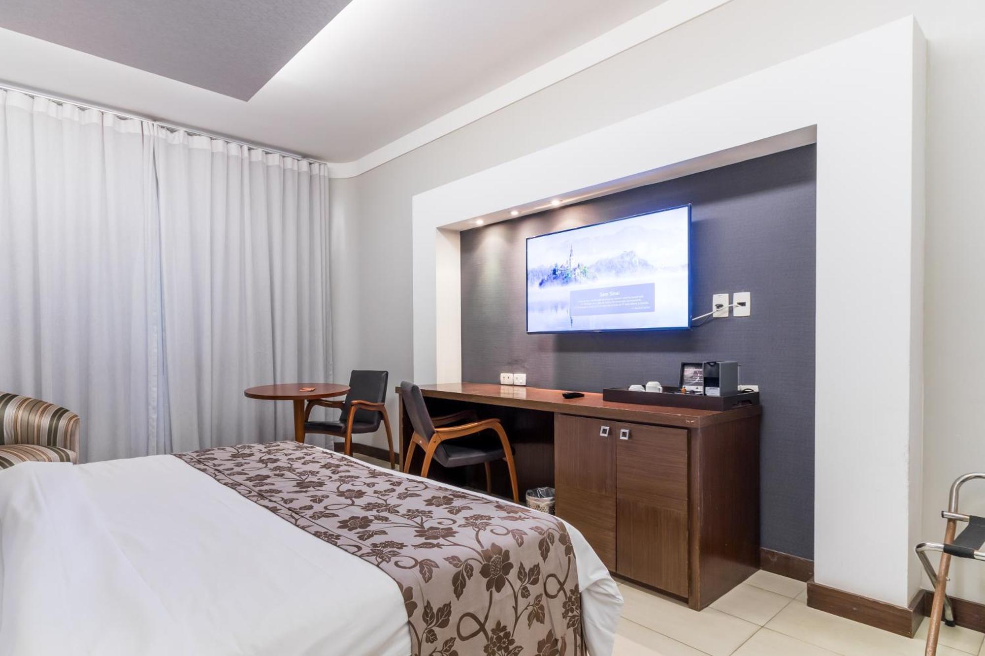 Parque Balneario Hotel Santos By Castelo Itaipava Ruang foto A room at the hotel
