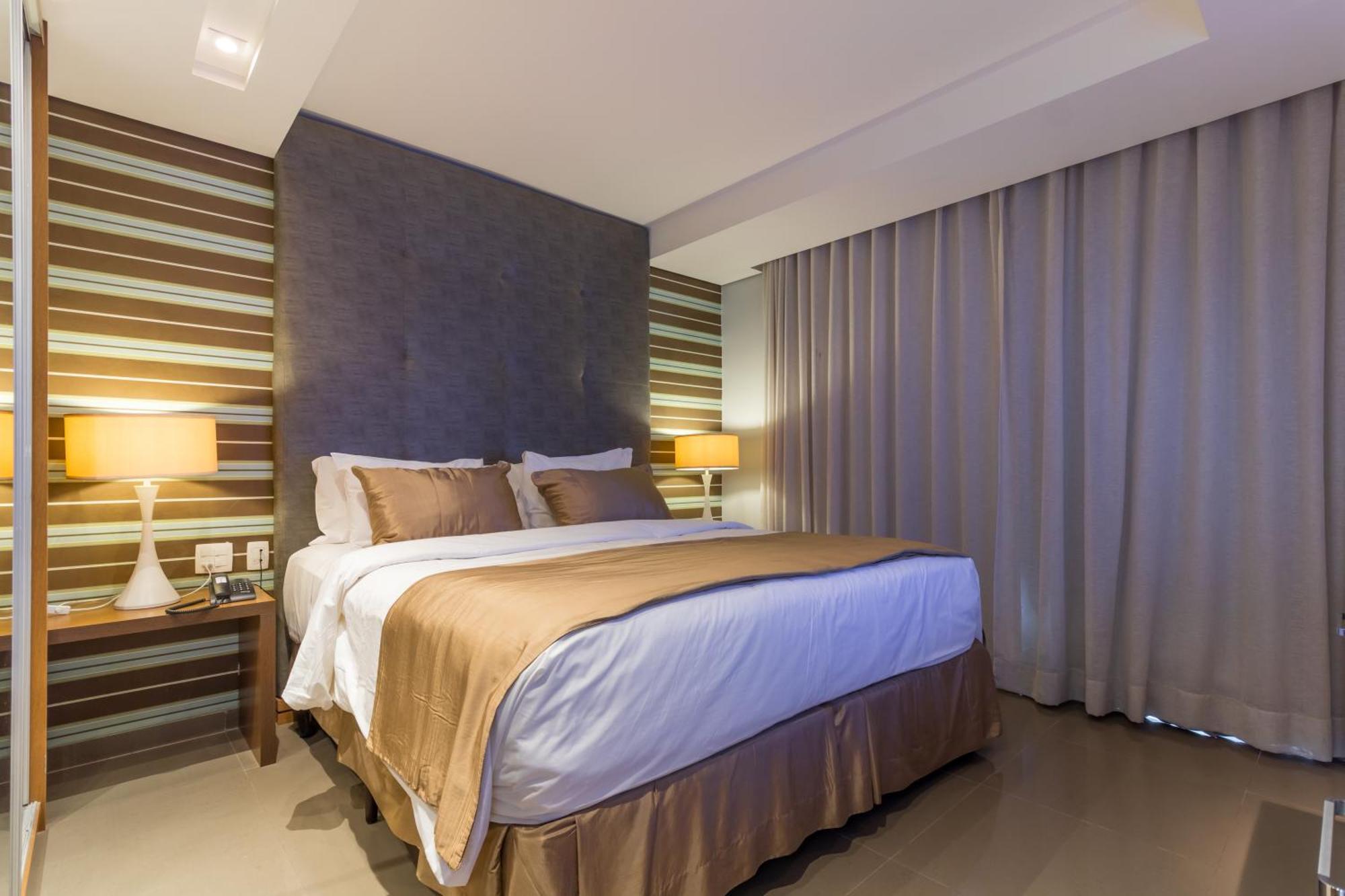 Parque Balneario Hotel Santos By Castelo Itaipava Ruang foto A bedroom at the hotel